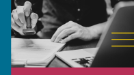 Person stamping a document